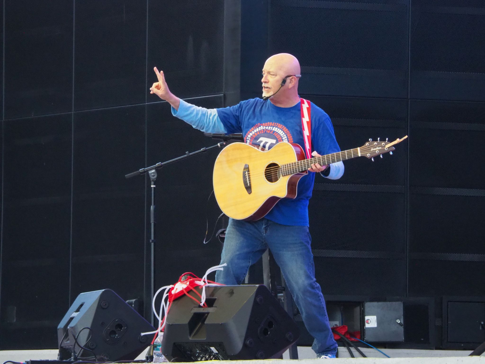 Roger Day performing on stage at The BayCare Sound in Downtown Clearwater to school children